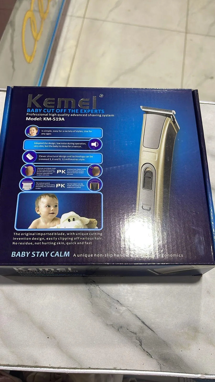 Kemei Men's Rechargeable Hair Trimmer with Easy-Clean Design